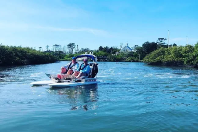 a small boat in a body of water