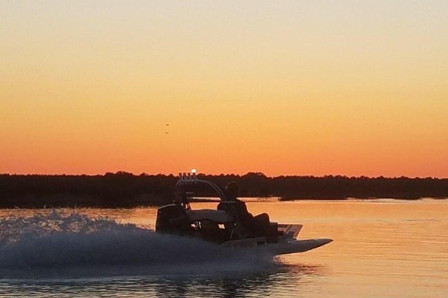 a sunset over a body of water