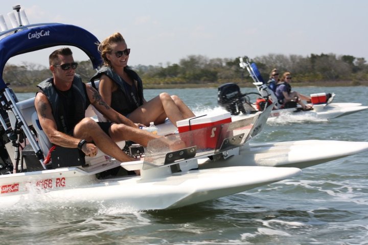 Man and woman on catamaran