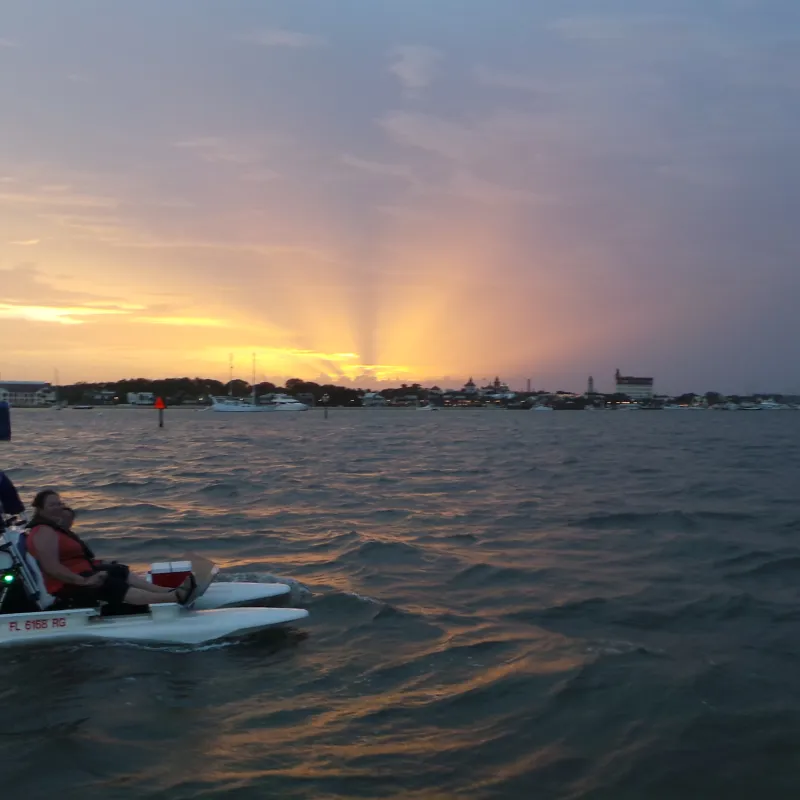 Catamaran next to sunset