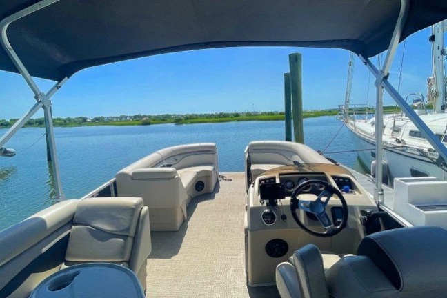 a plane sitting on top of a car