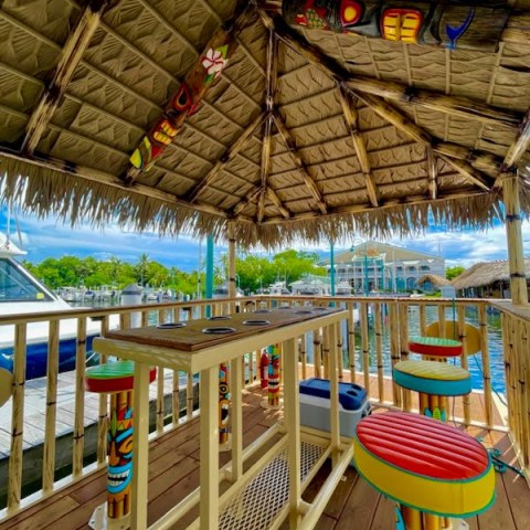 a chair sitting in front of a fence